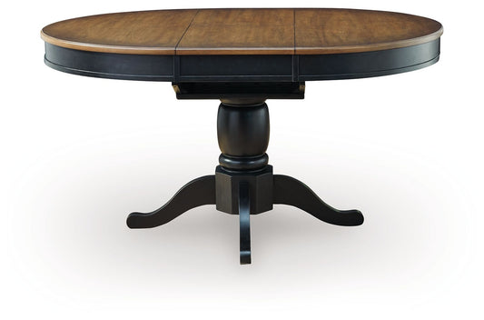 Clorazi - Oval Dining Room Butterfly Extension Table - Black / Brown