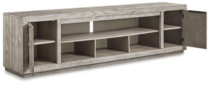 Naydell - XL TV Stand With Fireplace Option - Gray