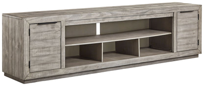 Naydell - XL TV Stand With Fireplace Option - Gray