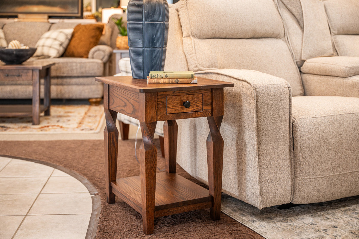 Brantley Wide End Table displayed beside a sofa